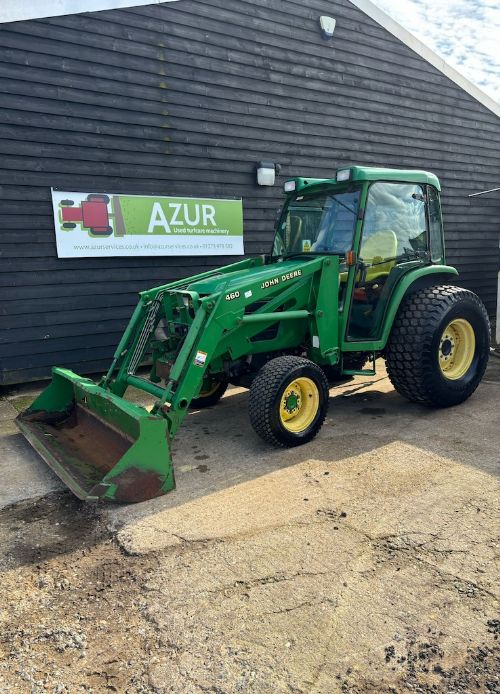 John Deere 4710 compact tractor with front loader and bucket for sale