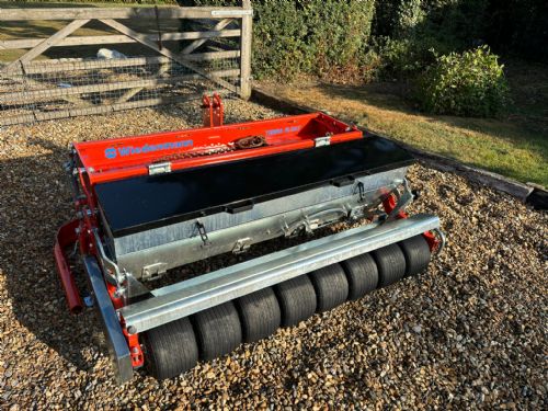 Wiedenmann Terra Float tractor mounted aerator with overseeder unit for sale